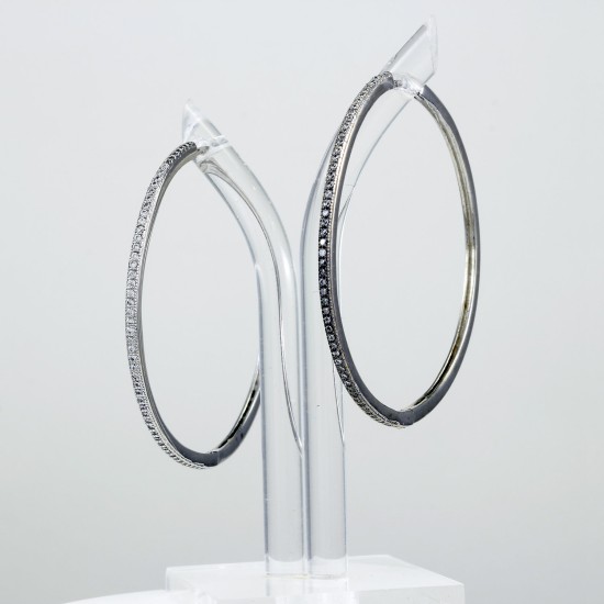 Fine hoop earring with lap white sapphire