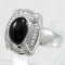 Fashionable ring with onyx 